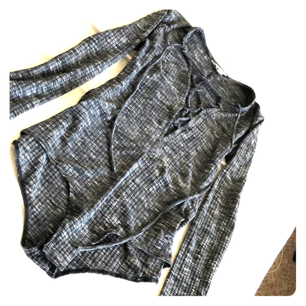 If you got it, flaunt it! Criss-Cross bodysuit!